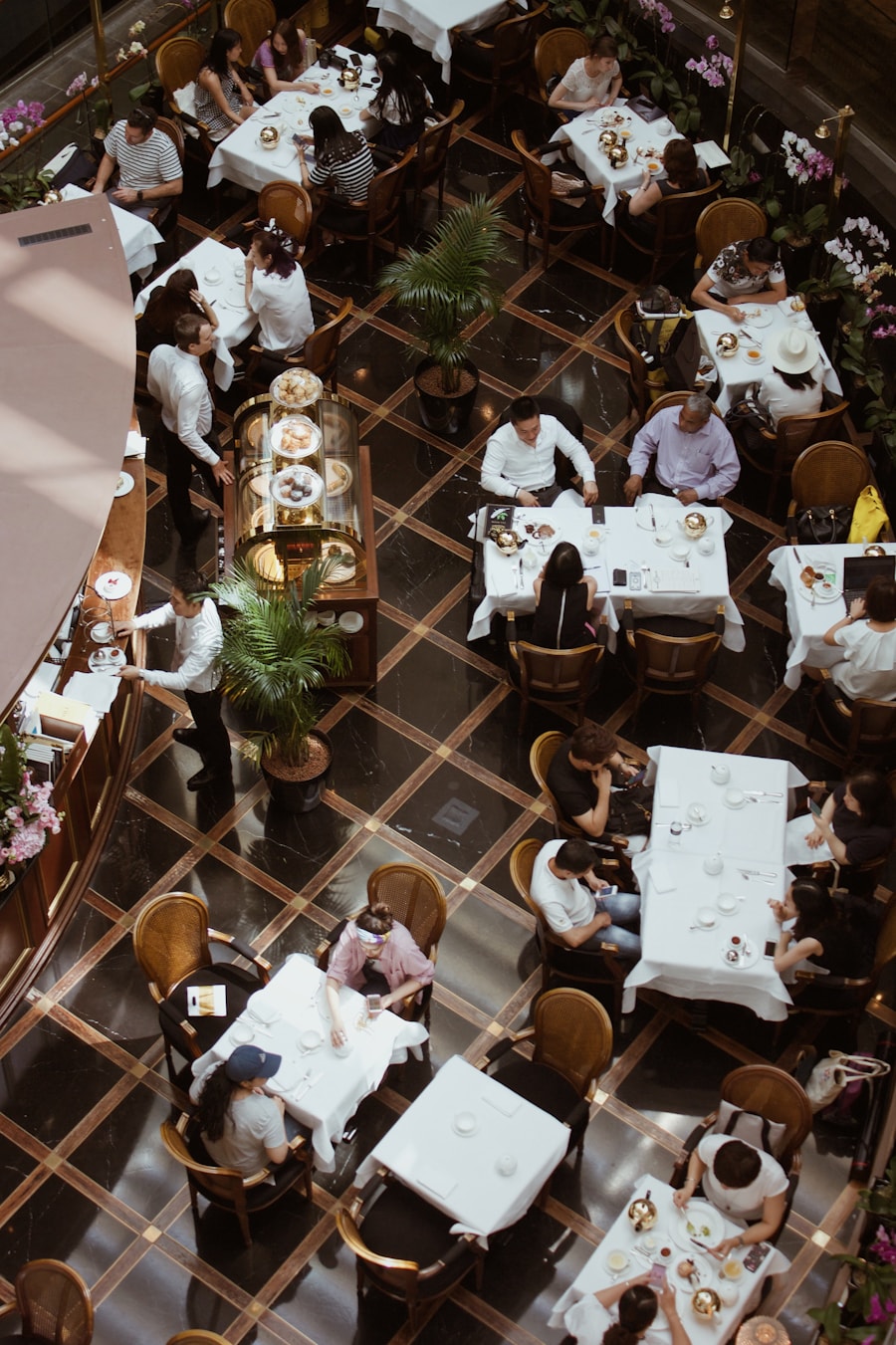 Overhead view of restaurant outdoor patio with diners at tables